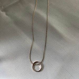 Costume gold necklace with circle pendant